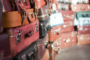 Pile of colorful suitcases.