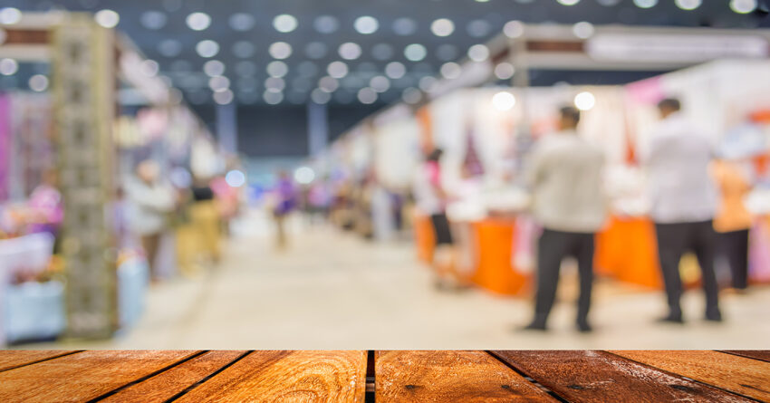 blurred image of shopping mall and people for background usage .