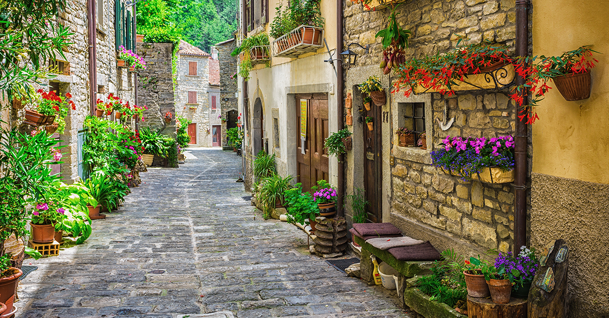 ITALY - JUNE 23, 2014: Typical Italian street in a small provincial town of Tuscan, Italy, Europe