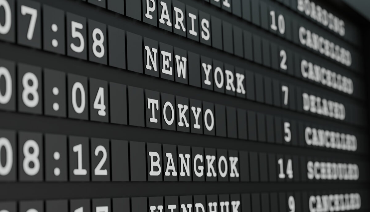 Flight board with some cancelled flights to Tokyo, Bangkok or delayed to New York. International airport, tourism and travel concept. 3D illustration