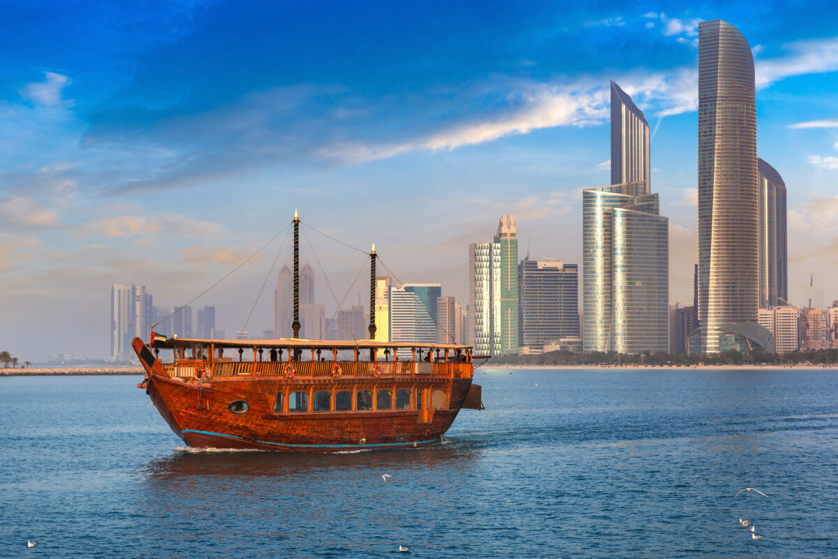 Cruise on traditional Dhow boat in Abu Dhabi in a summer day, United Arab Emirates