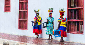 CARTAGENA DE INDIAS, COLOMBIA - AUGUST, 2018: Traditional fruits street vendor in Cartagena de Indias called Palenquera