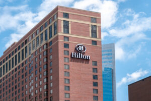 MINNEAPOLIS, MN/USA - JUNE 30, 2018: Hilton Hotel exterior and trademark logo. Hilton Hotels and Resorts is a global brand of full-service hotels.