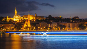 Light paths simulating river cruise going down river in European city